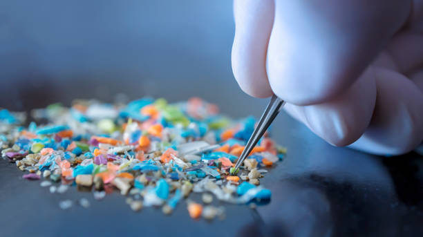 Macro shot of micro plastics. Cool blue filter applied.